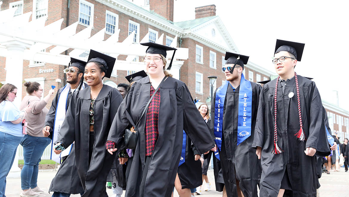 Hartwick College graduates of the Class of 2024 on Last Walk on Founders' Way