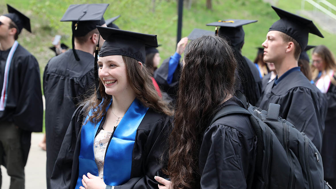 Hartwick College graduate after Last Walk on Founders' Way