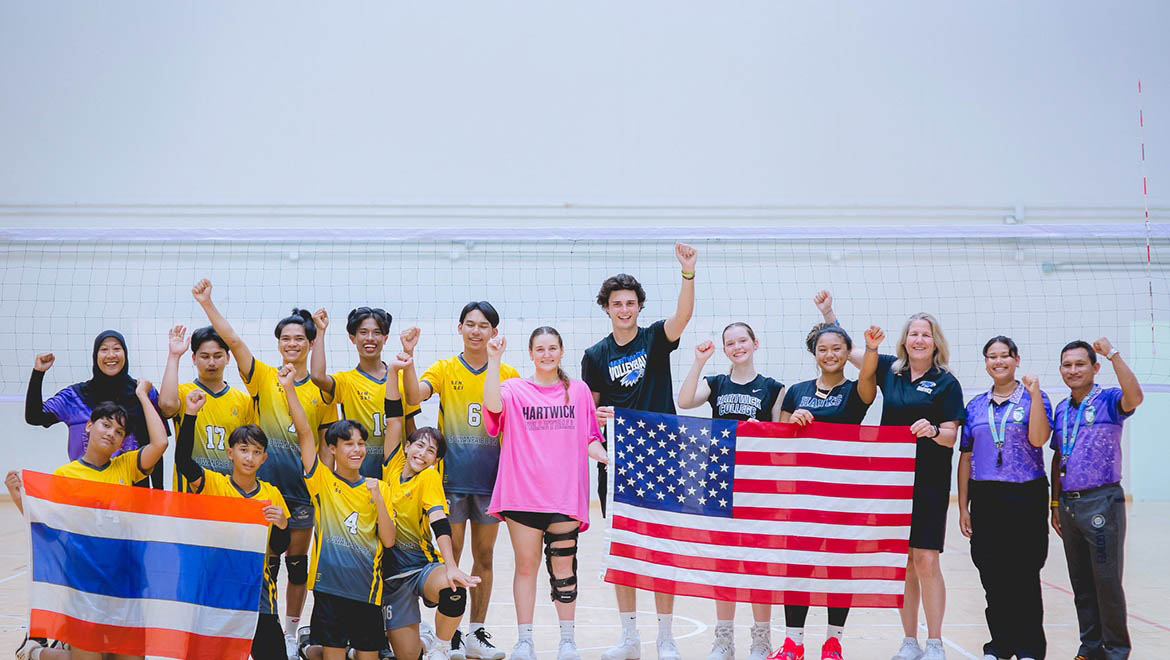 Hartwick College Delegation participants in the U.S. State Department’s Bureau of Education and Cultural Affairs Sports Diplomacy Division at volleyball tournament with Thai volleyball players