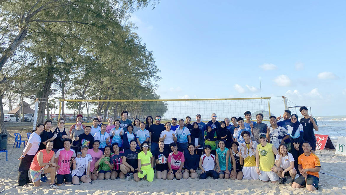 Hartwick College Delegation participants in the U.S. State Department’s Bureau of Education and Cultural Affairs Sports Diplomacy Division at volleyball tournament with Thai volleyball players on beach