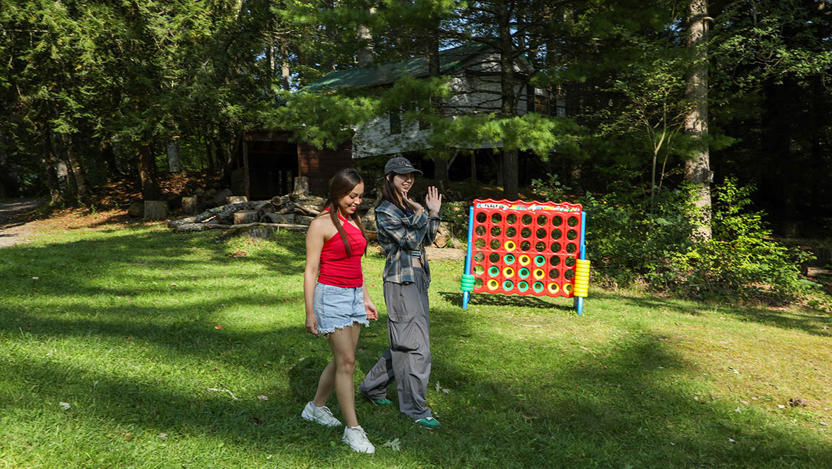 Hartwick College students walking at Pine Lake Environmental Campus