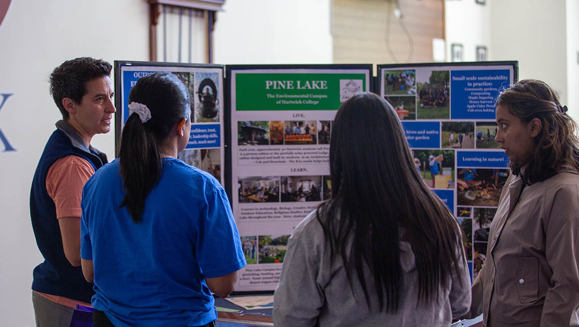 Hartwick College new students learning about Pine Lake Environmental Campus at Wellness Fair during Wick Week