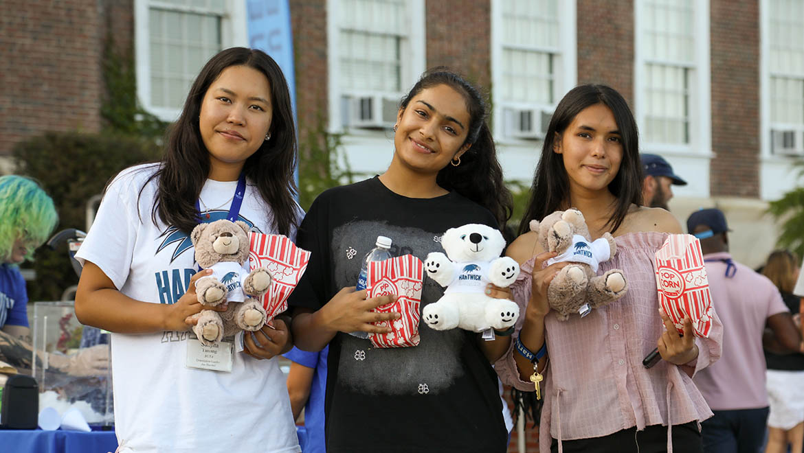 Hartwick College students with Teddy Bears on Founders' Way during True Blue Weekend