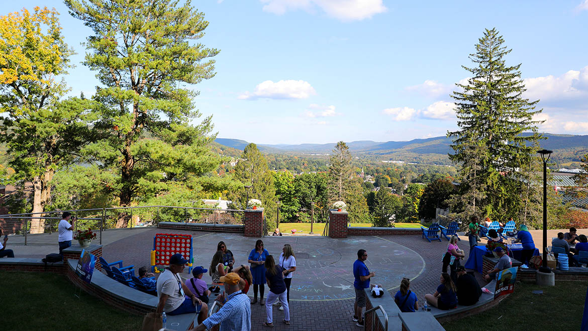 Hartwick College alumni, students and families gather on Founders' Way during True Blue Weekend