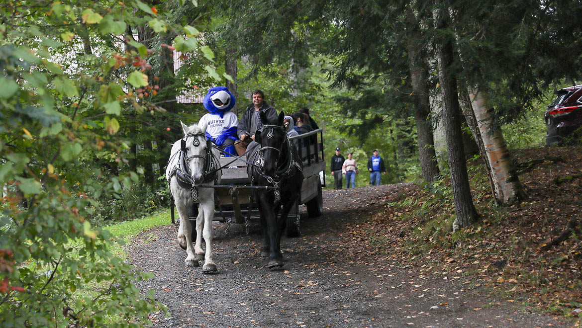 Swoop on wagon ride with Hartwick families at Pine Lake