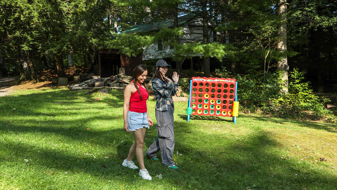 Students playing lawn games at Pine Lake Environmental Campus